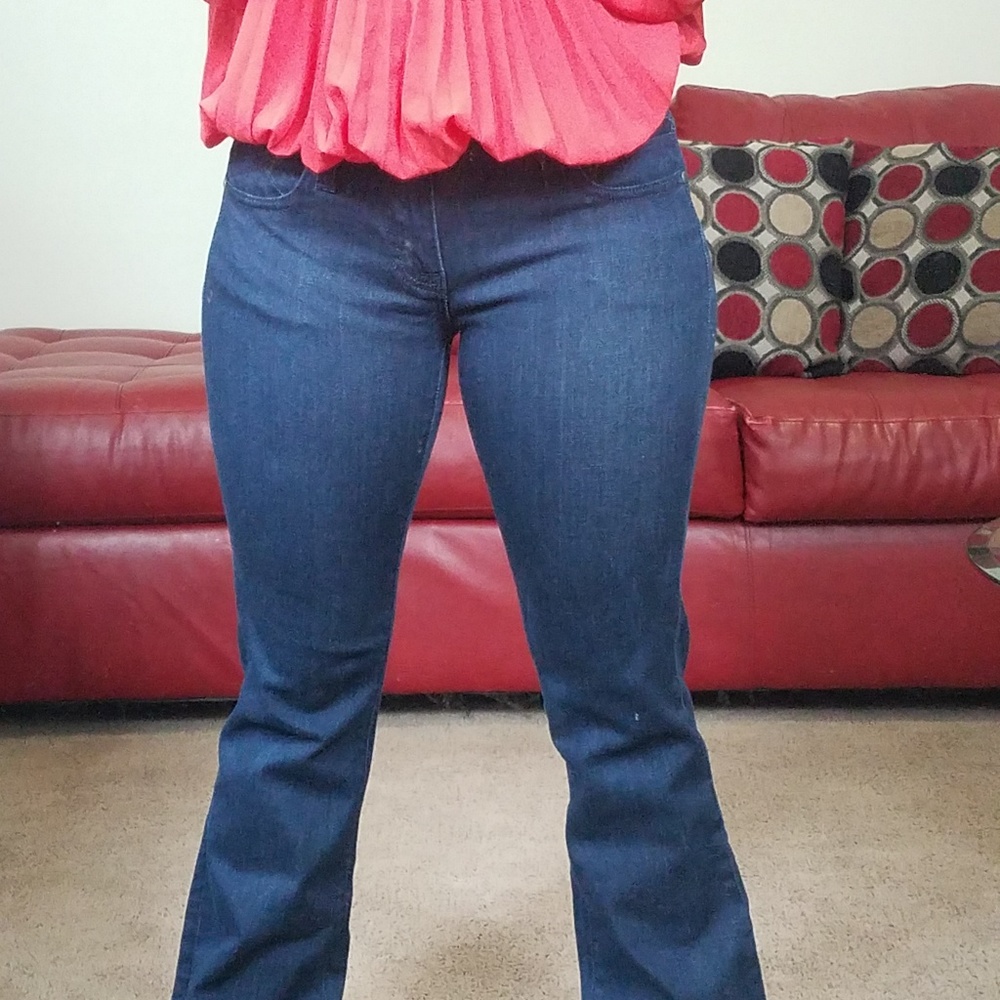 Cold shoulder orange top and boot cut Jeans